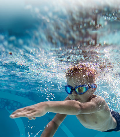 Photo of boy swimming forward: we are working to make a difference for patients with rare endocrine diseases and cancer